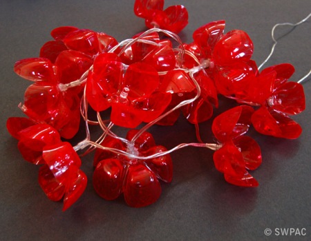 plastic bottle flowers for Christmas lights by Sylvia